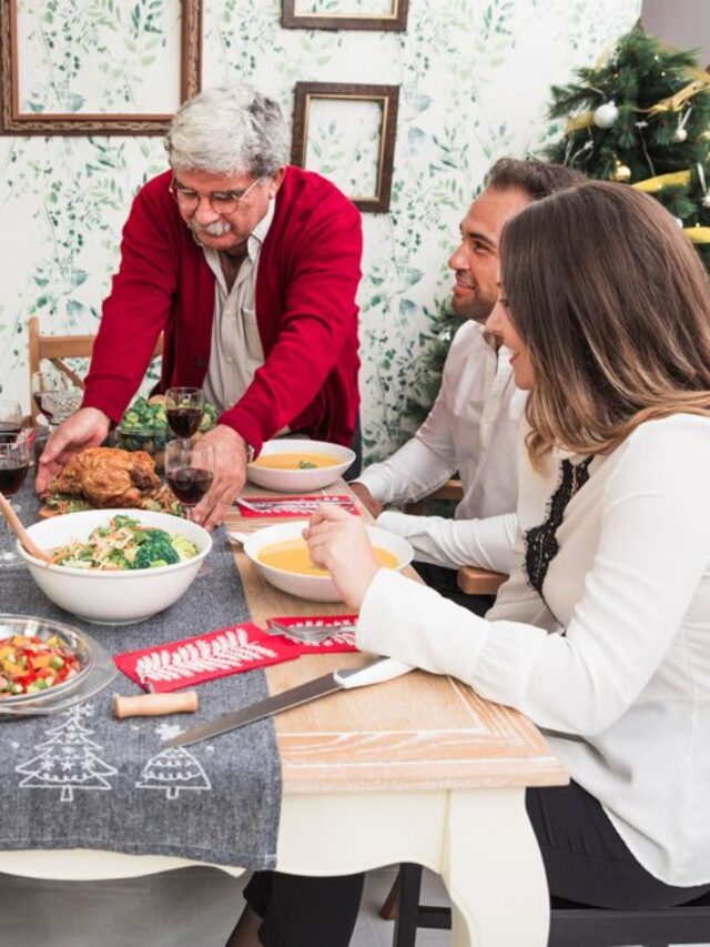 old-man-putting-roasted-chicken-christmas-table_23-2147973658