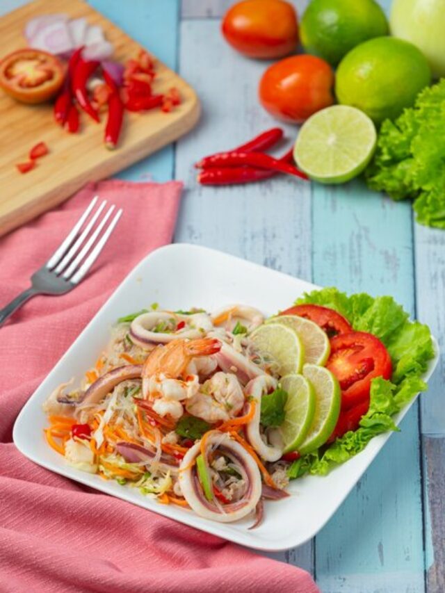 spicy-mixed-seafood-salad-with-thai-food-ingredients_1150-26442